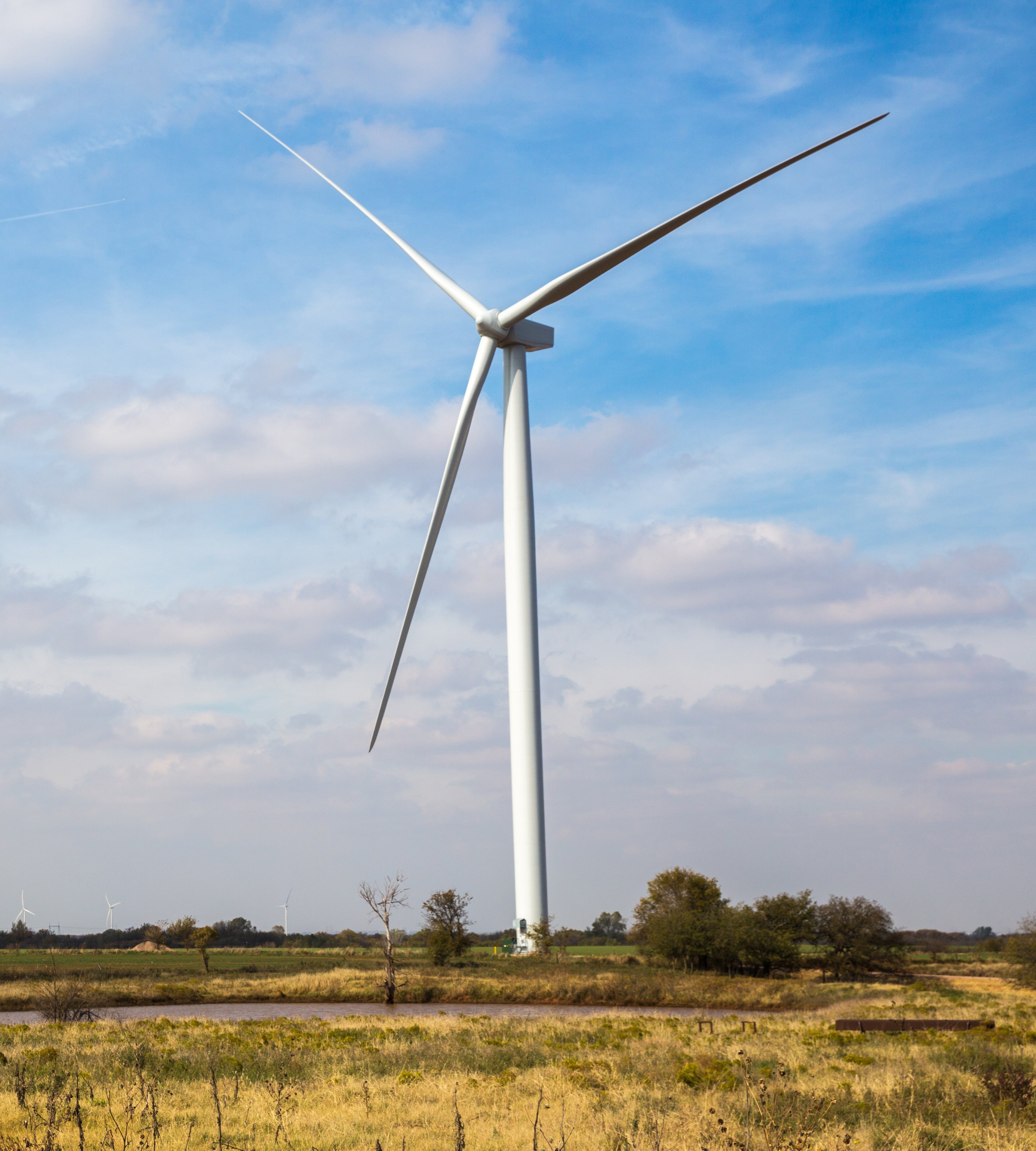 Wind turbine in an open field